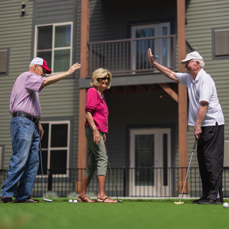 Civitas Senior Living | Residents golfing