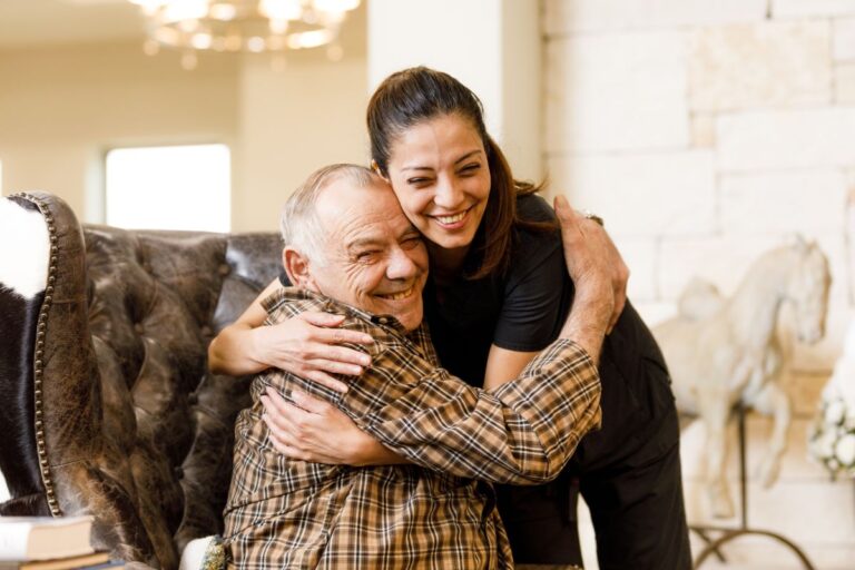 Civitas Senior Living | Senior and caregiver hugging