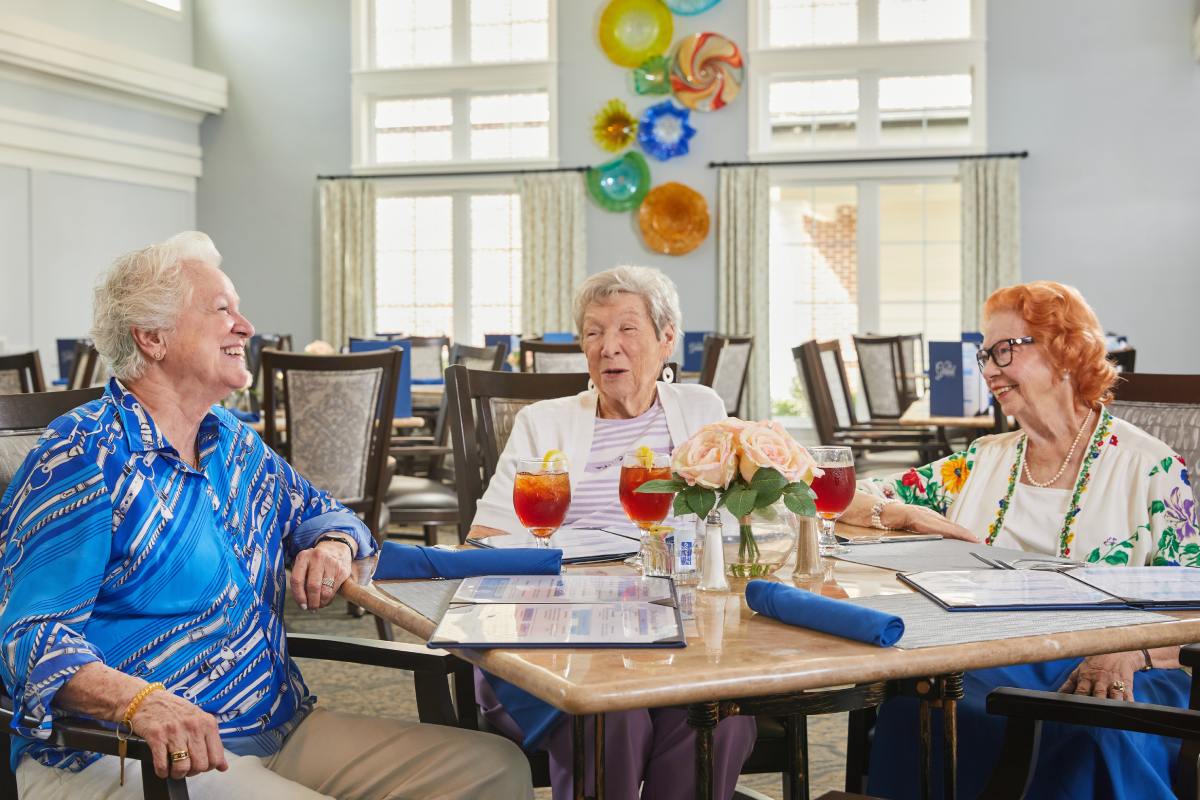 Civitas Senior Living | Senior women sitting around the dinner table