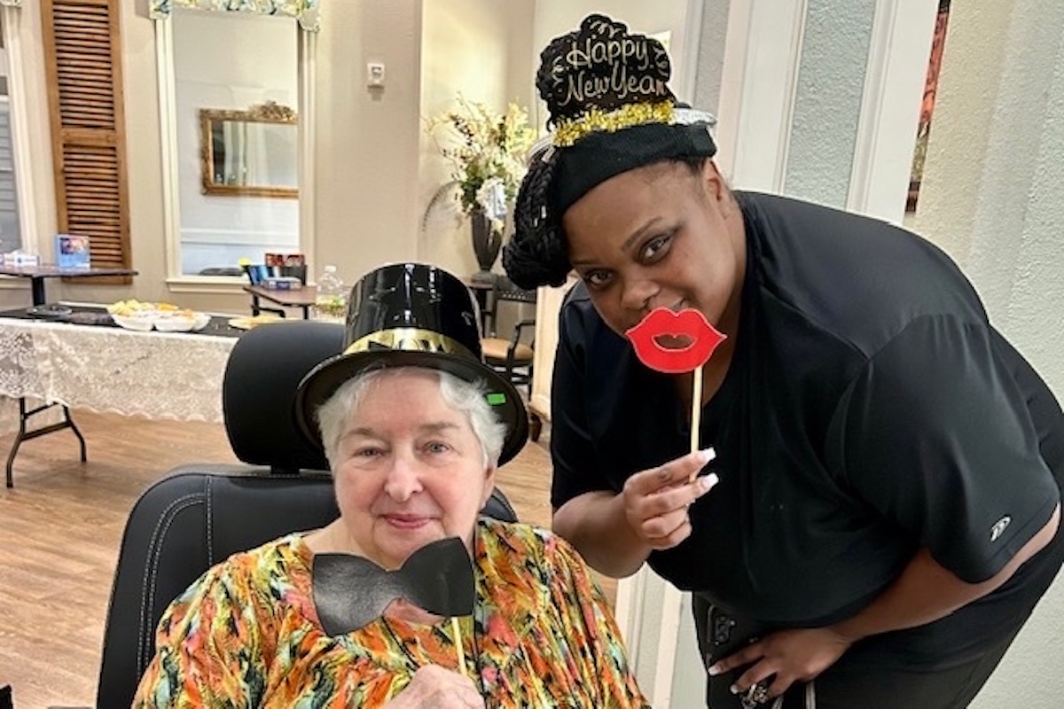 Civitas Senior Living | Team member and resident celebrating new years