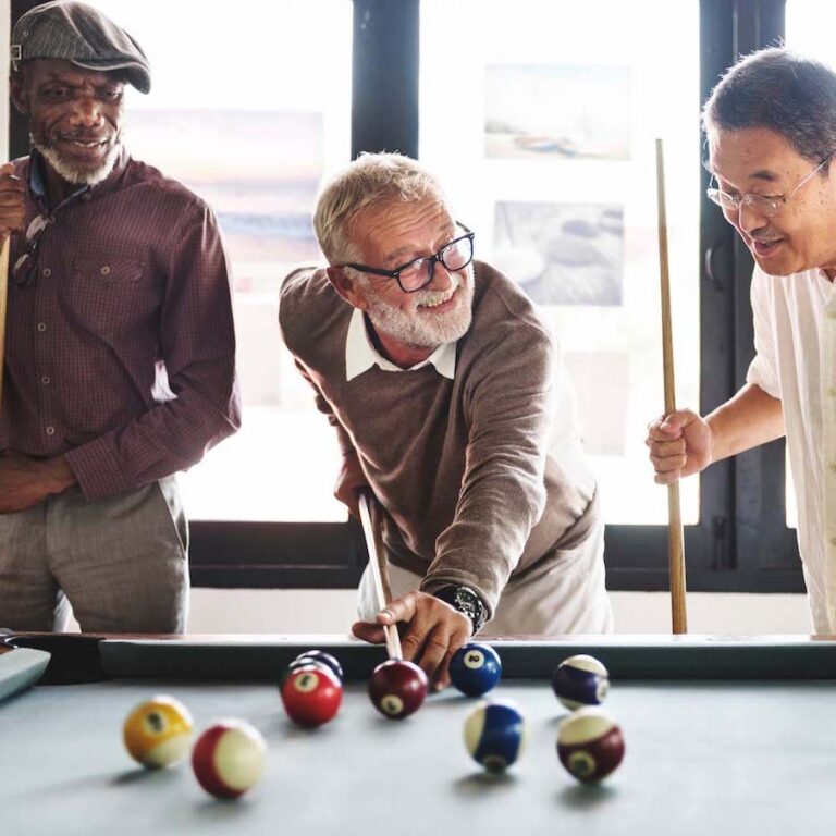 Double Creek | Group of seniors playing pool
