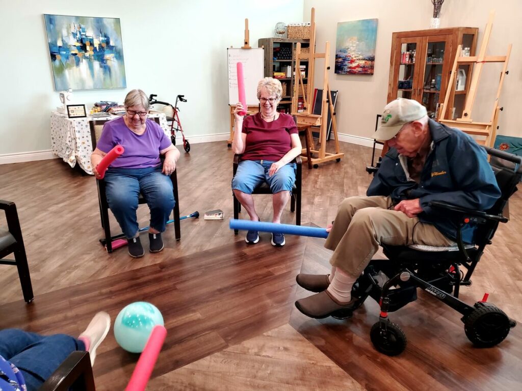 Double Creek Assisted Living and Memory Care | Residents playing noodle soccer