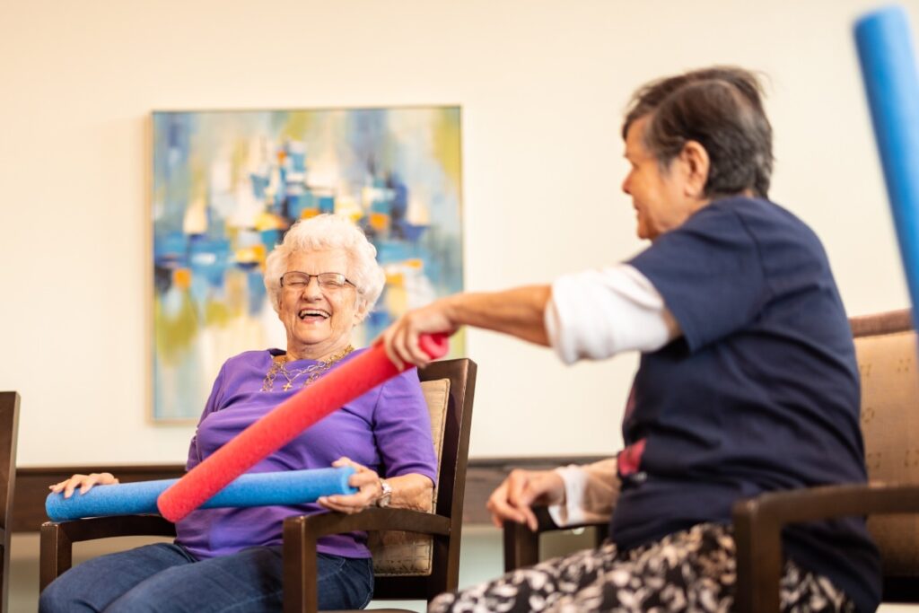 Civitas Senior Living | Happy seniors playing a game