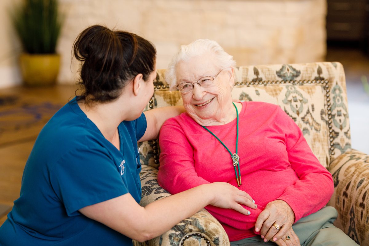 Civitas Senior Living | Senior woman talking with caregiver