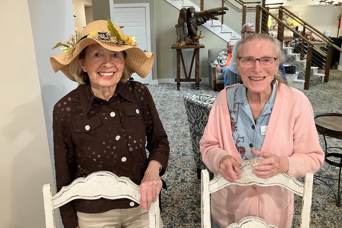 Ledgestone Senior Living | Senior friends smiling over a drink