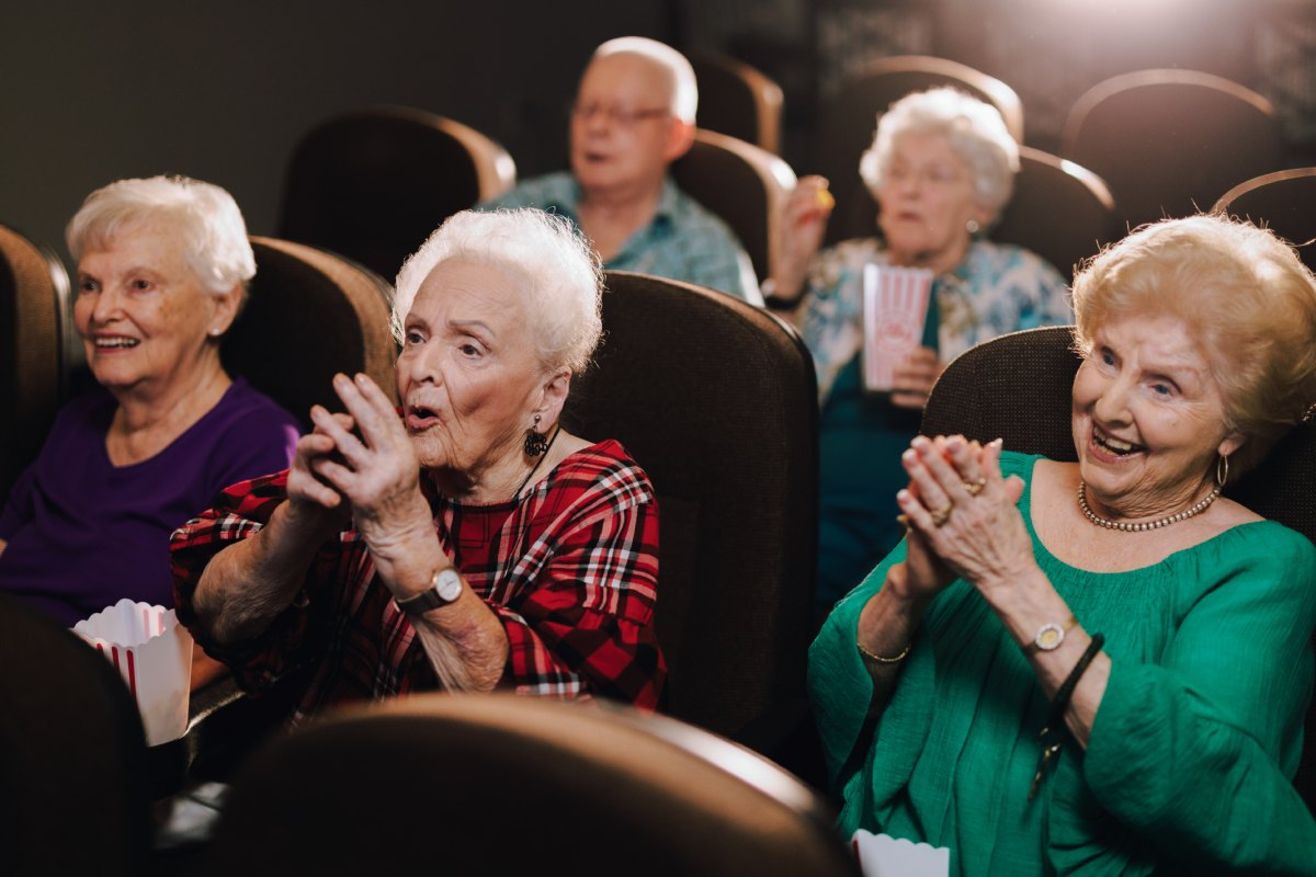 Civitias Senior Living | Seniors watching a show in a theater