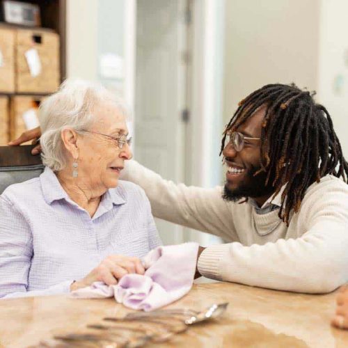 Civitas Senior Living | Senior resident talking with caregiver