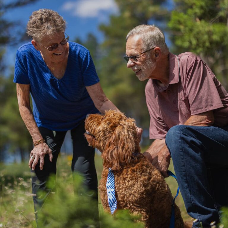 The Bluffs of Flagstaff | Pet friendly apartments - senior couple with dog