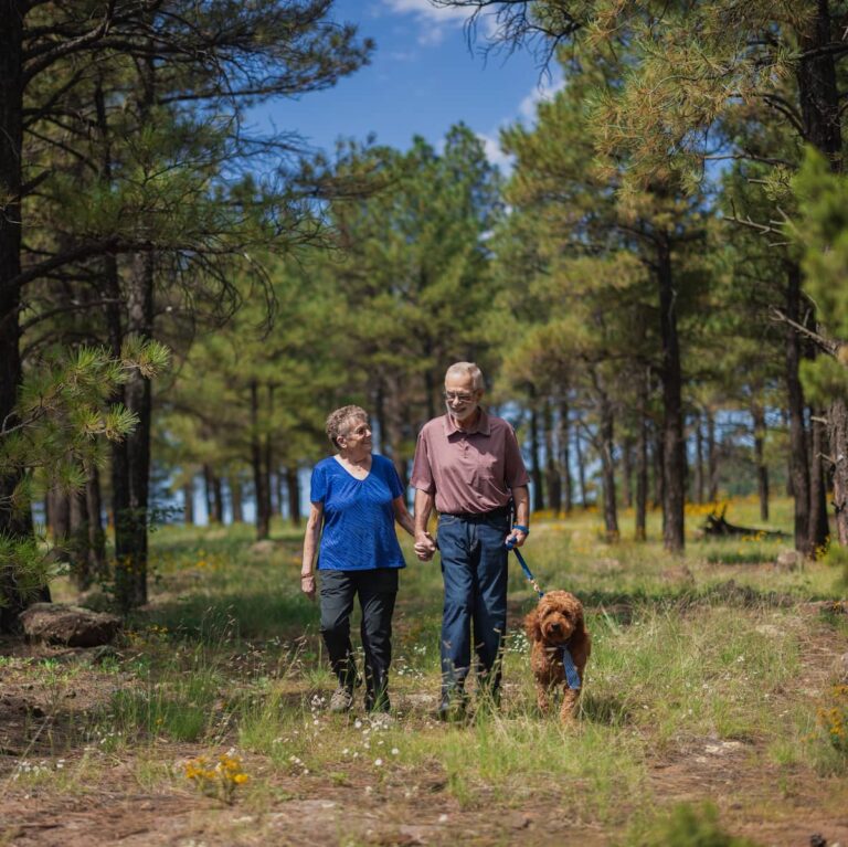 The Bluffs of Flagstaff | Senior couple enjoying community outdoors