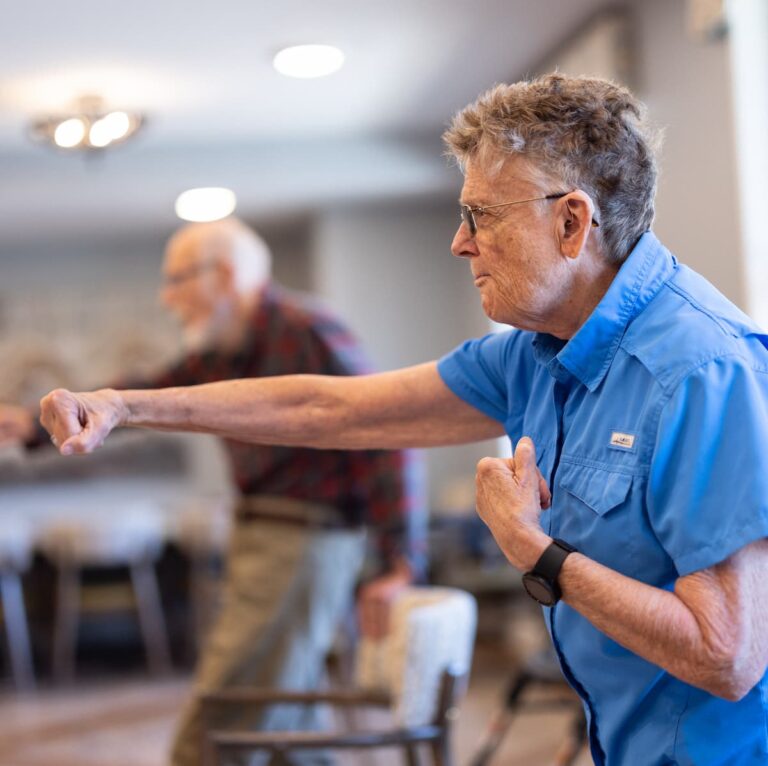 The Bluffs of Flagstaff | Senior man doing balancing exercises