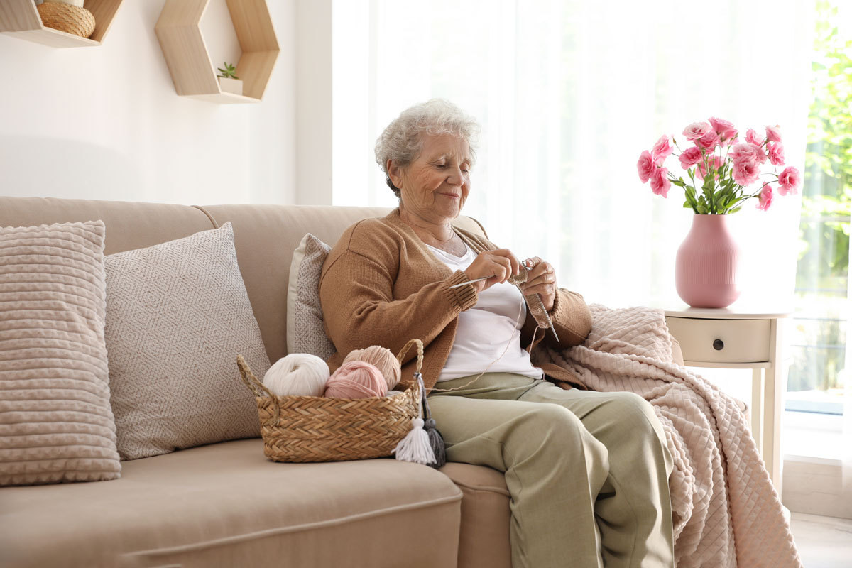 The Brooks of Cibolo | Woman knitting retirement flowers