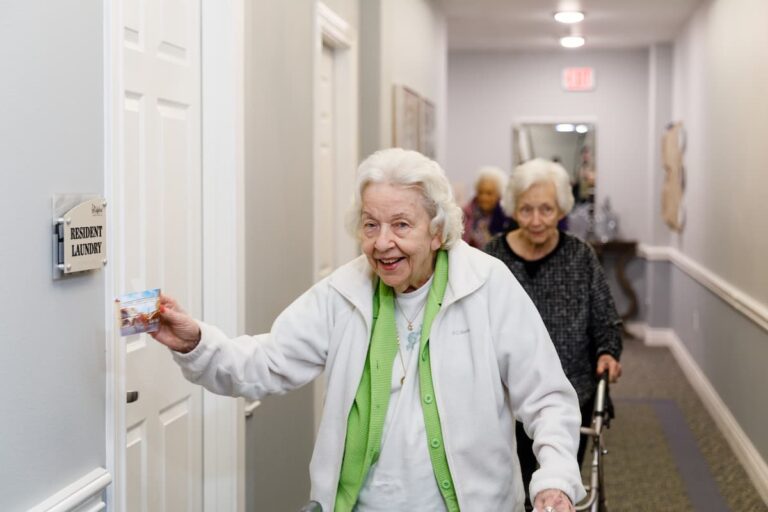 Civitas Senior Living | Residents walking through the hall of a senior living community