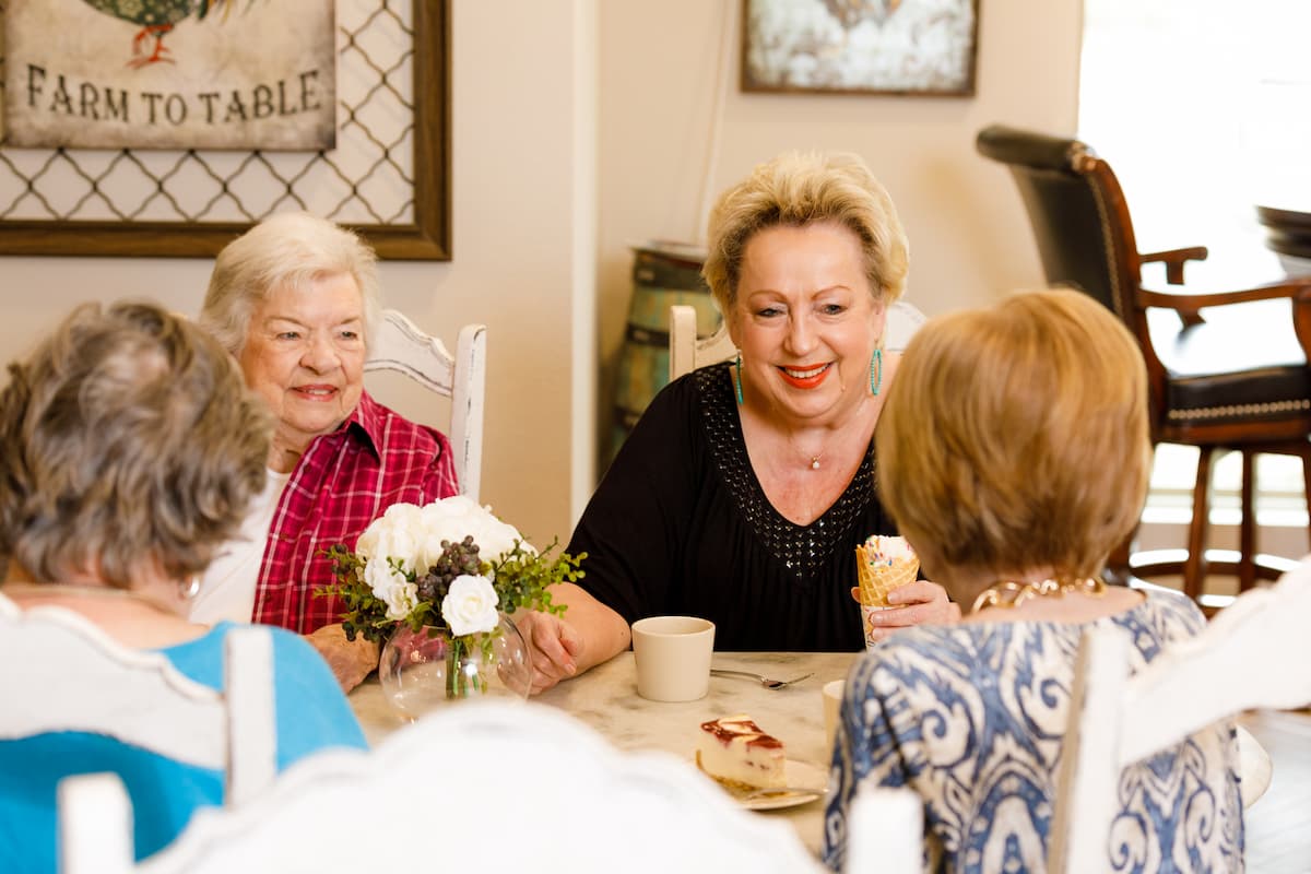 Civitas Senior Living | Seniors eating together like family