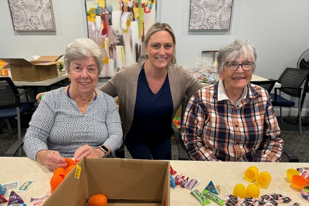 The Grand Senior Living | Senior friends making easter eggs