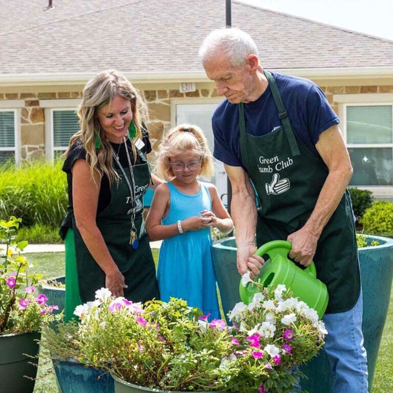 Civitas Senior Living | Senior resident gardening with caregiver