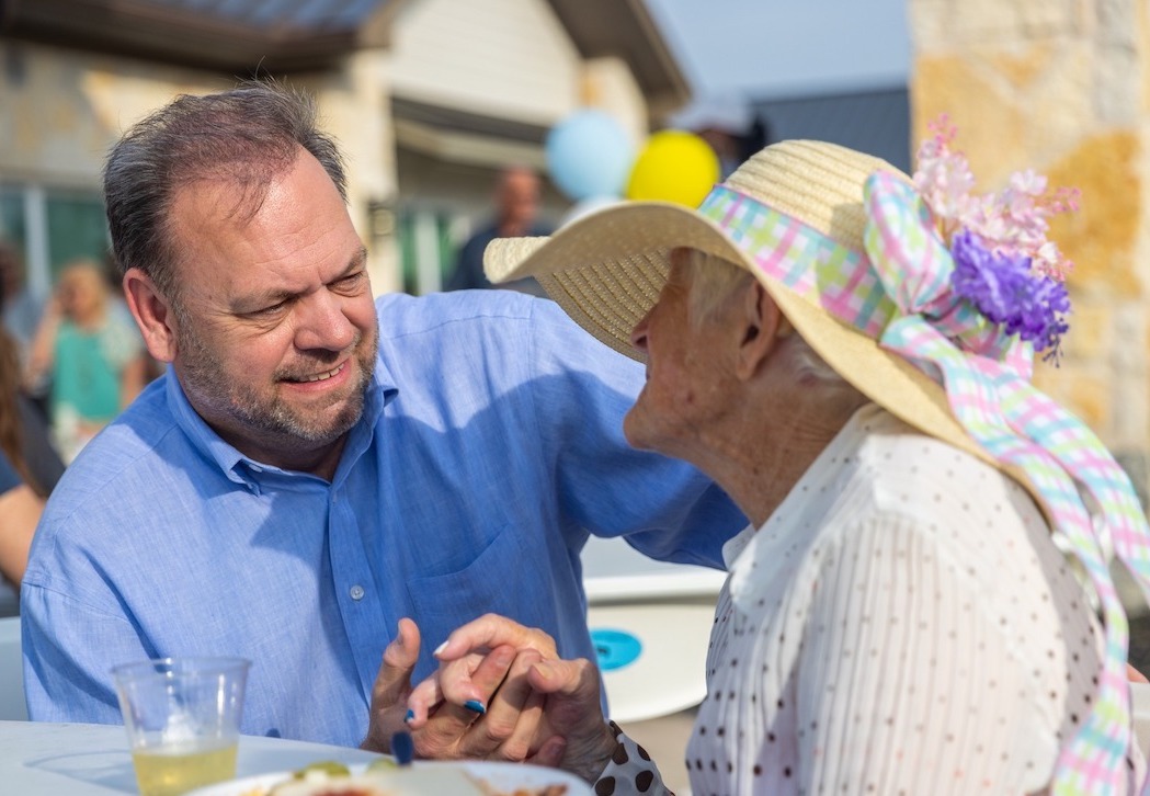 Civitas Senior Living | Civitas co-founder speaking to a resident