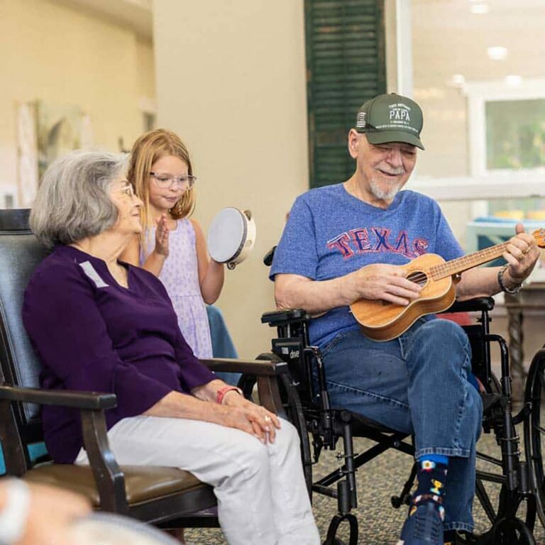 Civitas Senior Living | Senior residents and family making music