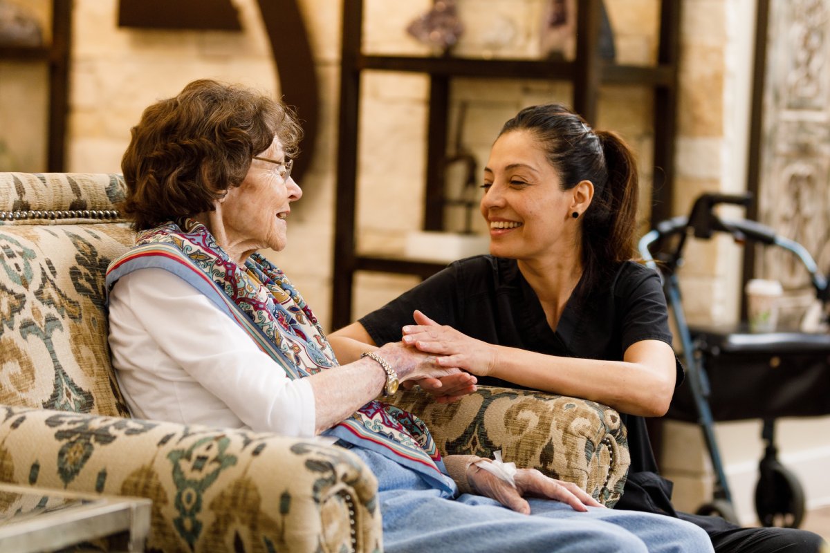 Civitas Senior Living | Senior woman talking with a caregiver