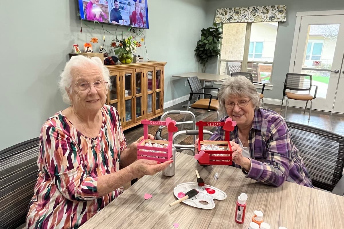 Civitas Senior Living | Seniors making Valentine's Day crafts