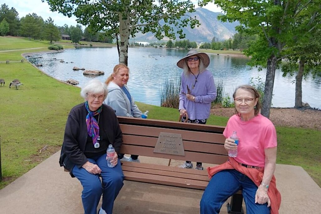 The Bluffs of Flagstaff | Senior residents next to a scenic view of Flagstaff
