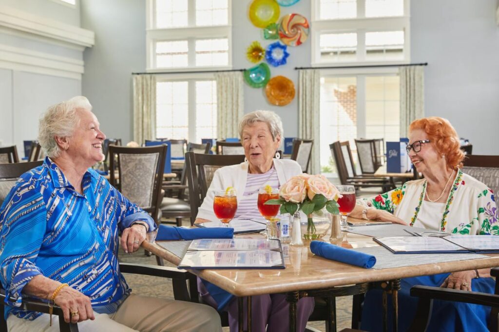 Civitas Senior Living | Senior women sitting around the dinner table