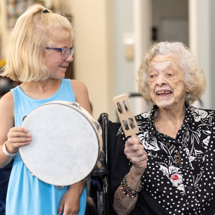 civitas-senior-living-senior-woman-tambourine